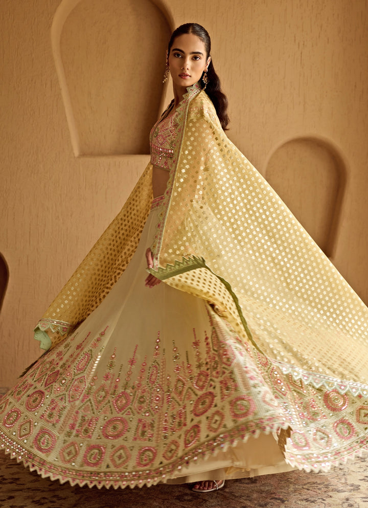 Ivory And Yellow Embroidered Tissue Lehenga