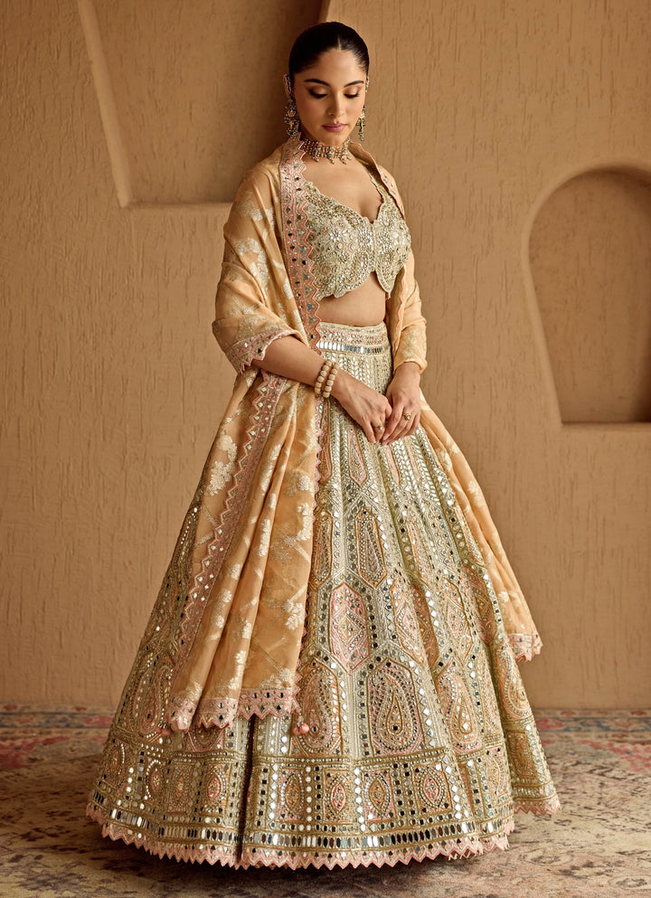 Ivory And Peach Mirror Embroidered Tissue Lehenga