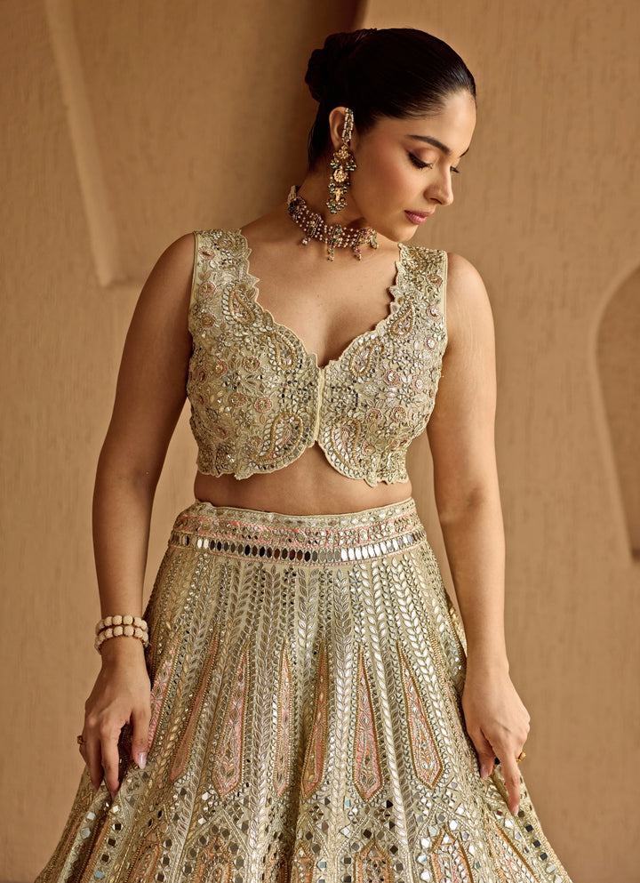 Ivory And Peach Mirror Embroidered Tissue Lehenga