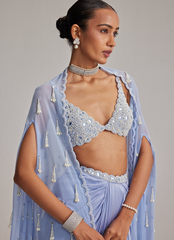 Dew Blue Pearl Embroidered Satin Drape Skirt Set With Cape Vvani by Vani Vats - Fabilicious Fashion