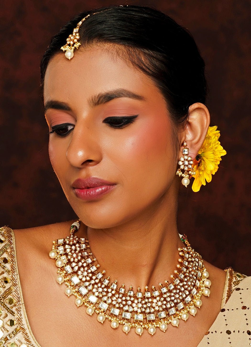 Gold Finish Kundan And Pearl Drop Necklace Set With Maang Tikka