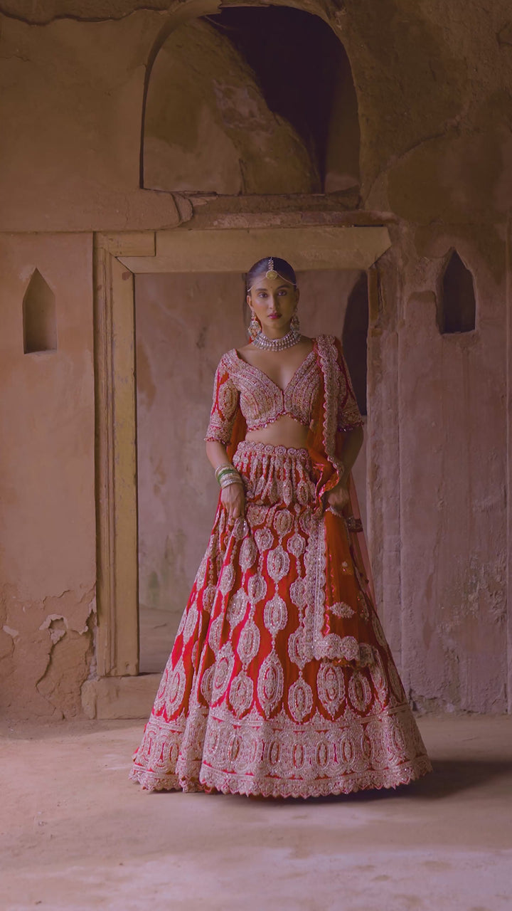 Scarlet Red Bridal Lehenga With Gold Embellished Work