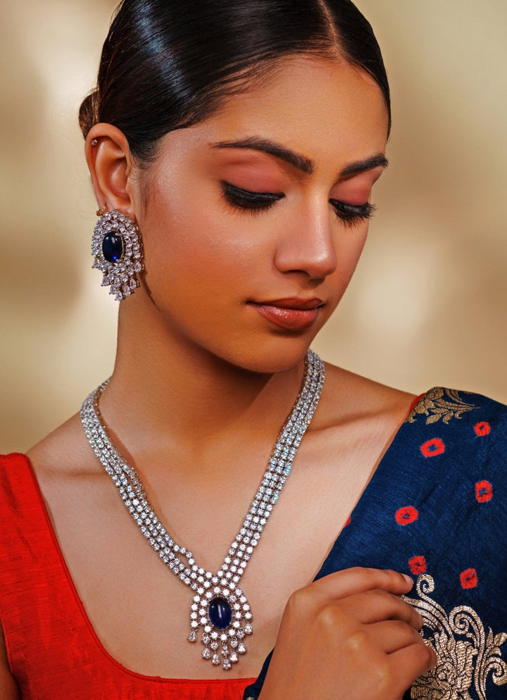 White Finish Diamond And Blue Pendant Necklace Set Zevar by Geeta - Fabilicious Fashion