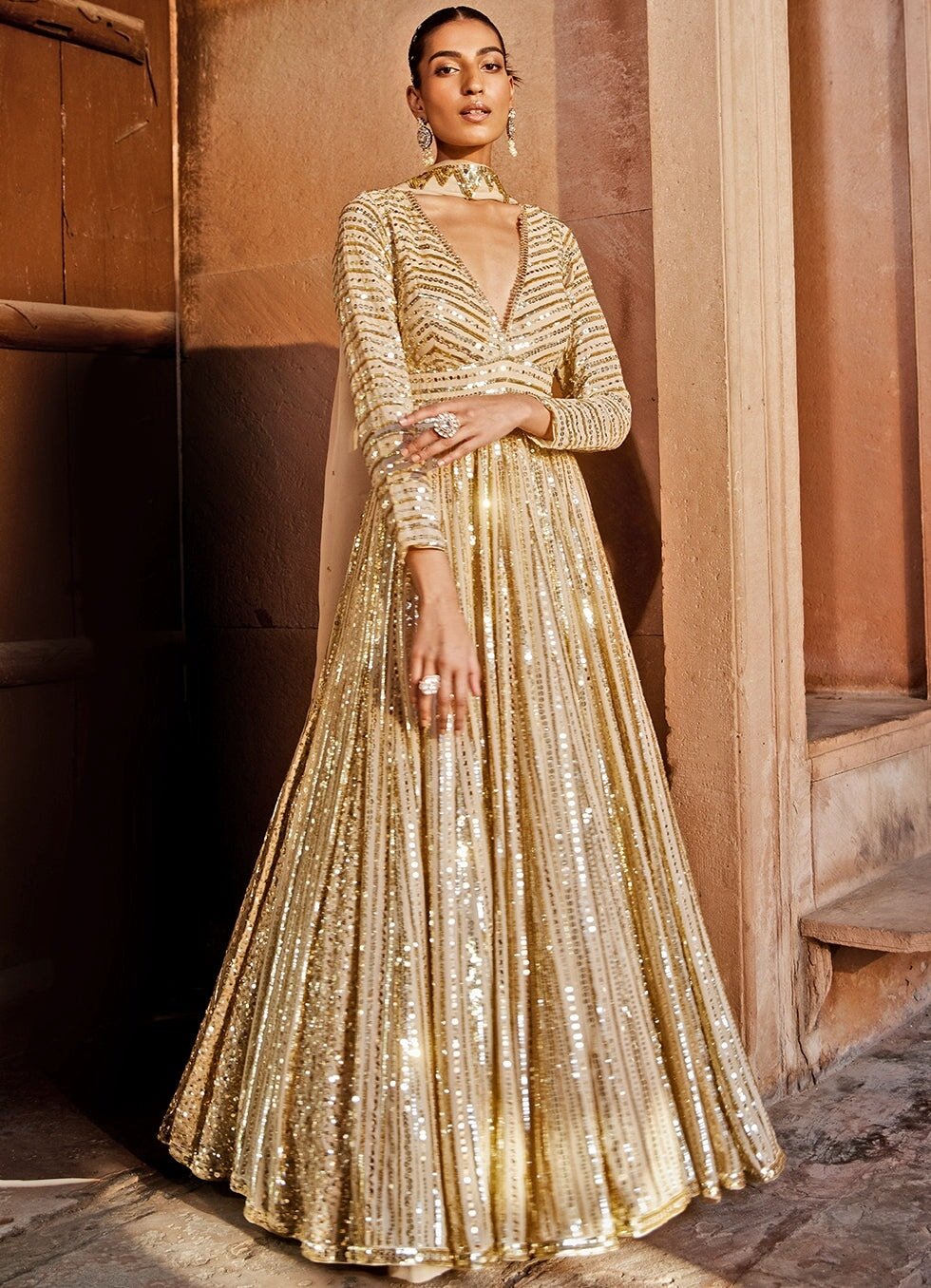 Prevasu — Beige Gold Embellished Georgette Anarkali Gown – Fabilicious  Fashion