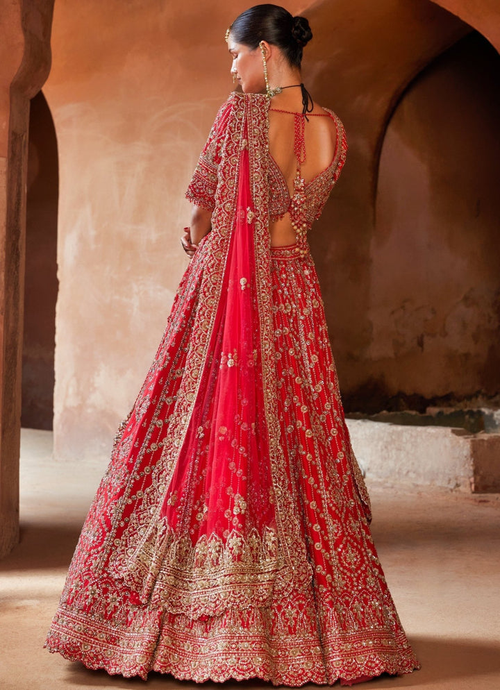 Vibrant Red Tasseled Bridal Silk Lehenga Set With Net Dupatta Nitika Gujral - Fabilicious Fashion