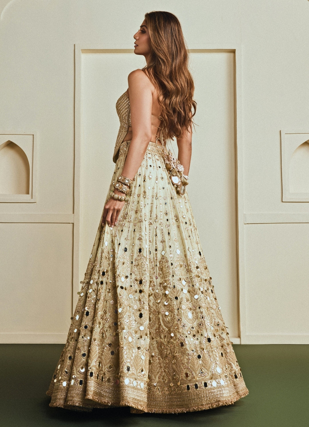 Gold Mirrorwork Tissue Corset Lehenga Set
