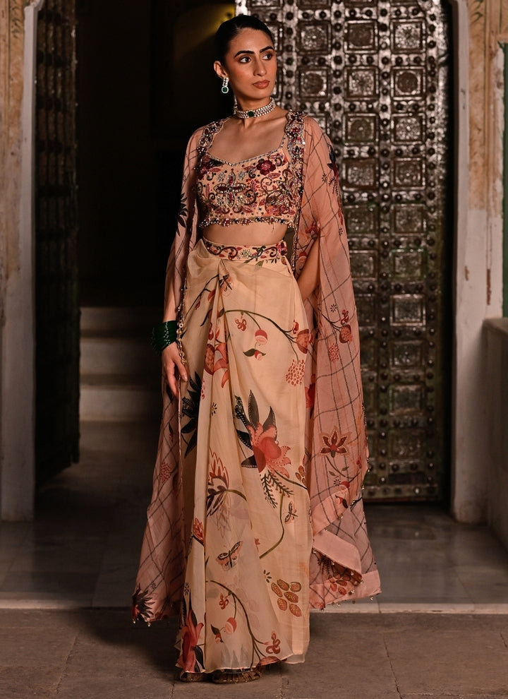 Muted Beige Pink Printed Organza Cowl Skirt Set With Cape