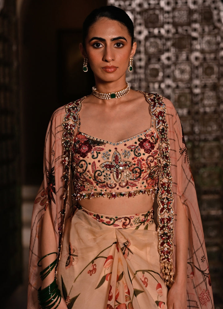 Muted Beige Pink Printed Organza Cowl Skirt Set With Cape