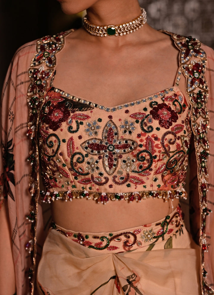 Muted Beige Pink Printed Organza Cowl Skirt Set With Cape