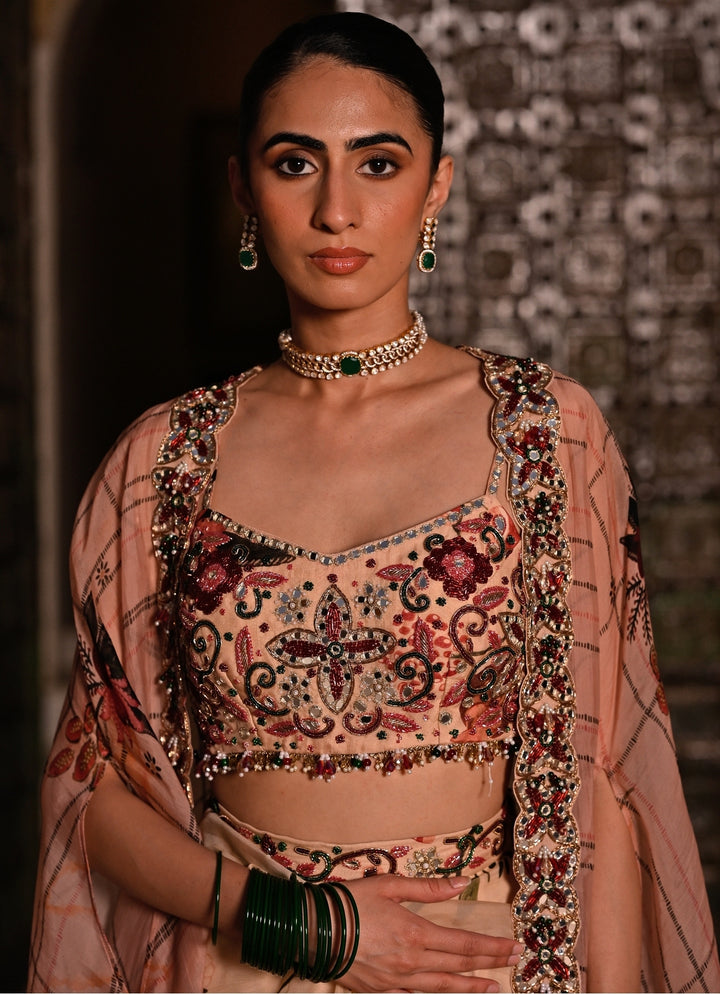 Muted Beige Pink Printed Organza Cowl Skirt Set With Cape