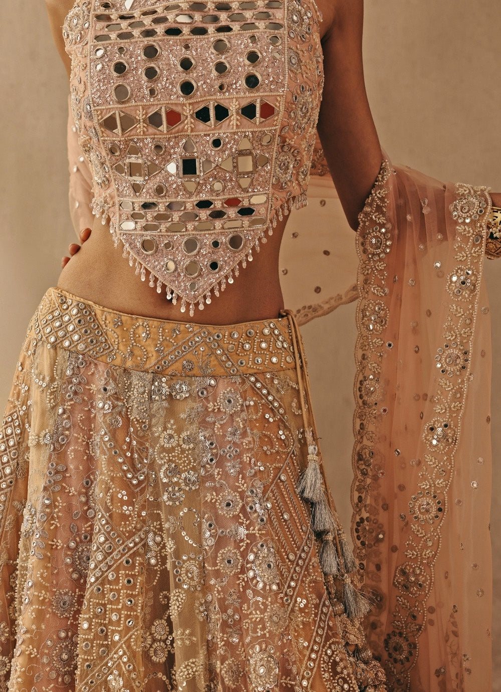 Peach Gold Soft Net Mirrorwork Corset Lehenga
