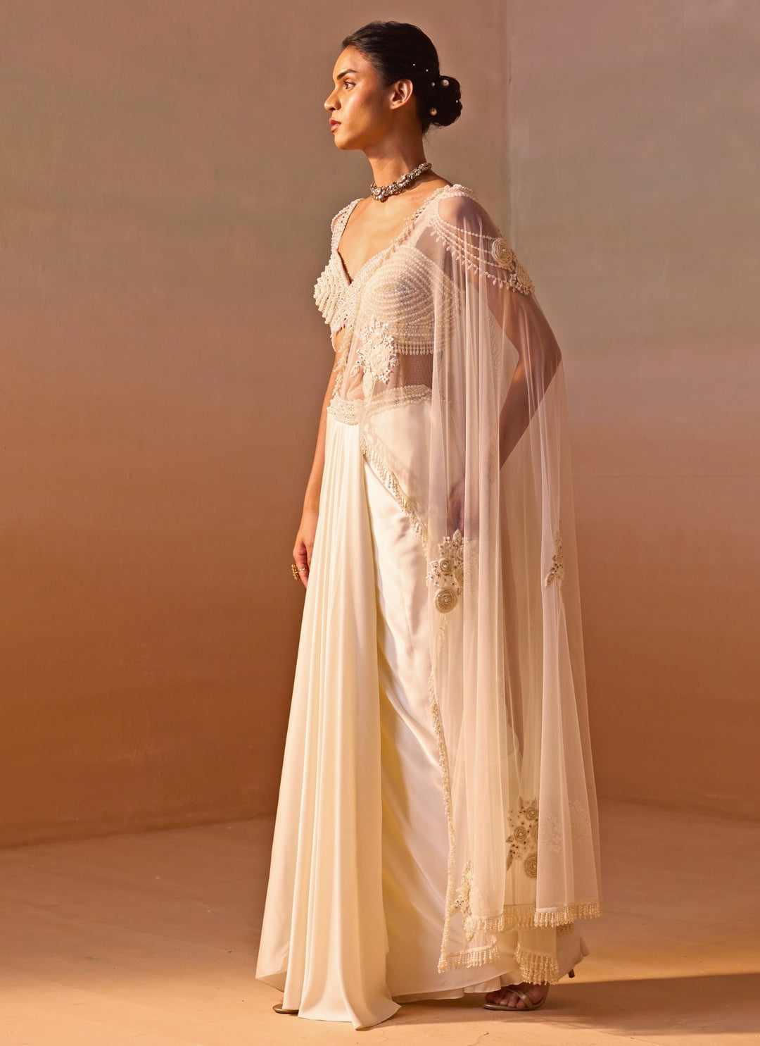Ivory Satin Pre-Draped Saree With Pearl Bustier