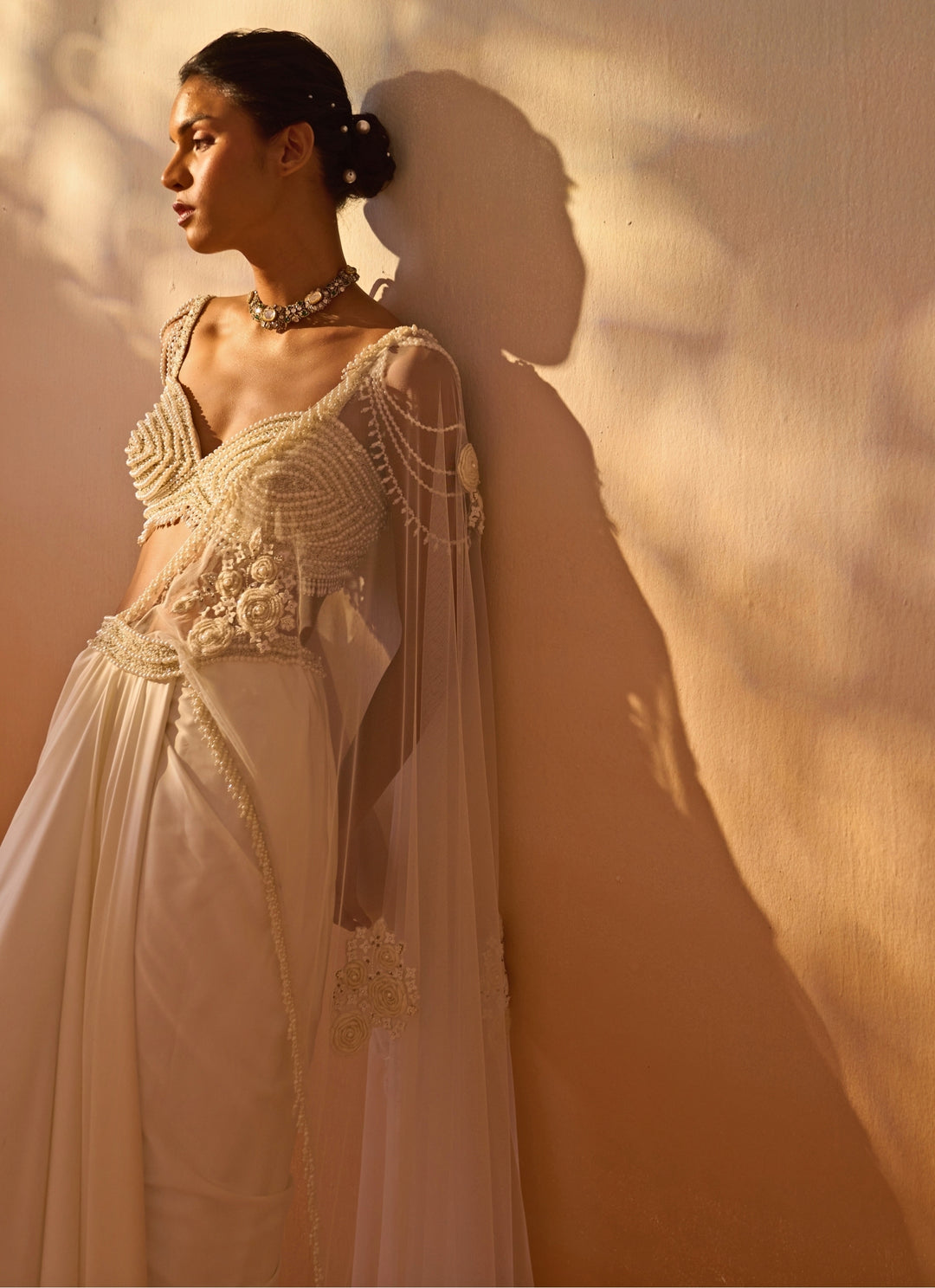 Ivory Satin Pre-Draped Saree With Pearl Bustier