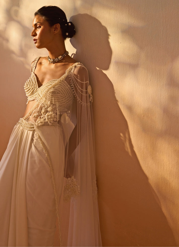 Ivory Satin Pre-Draped Saree With Pearl Bustier