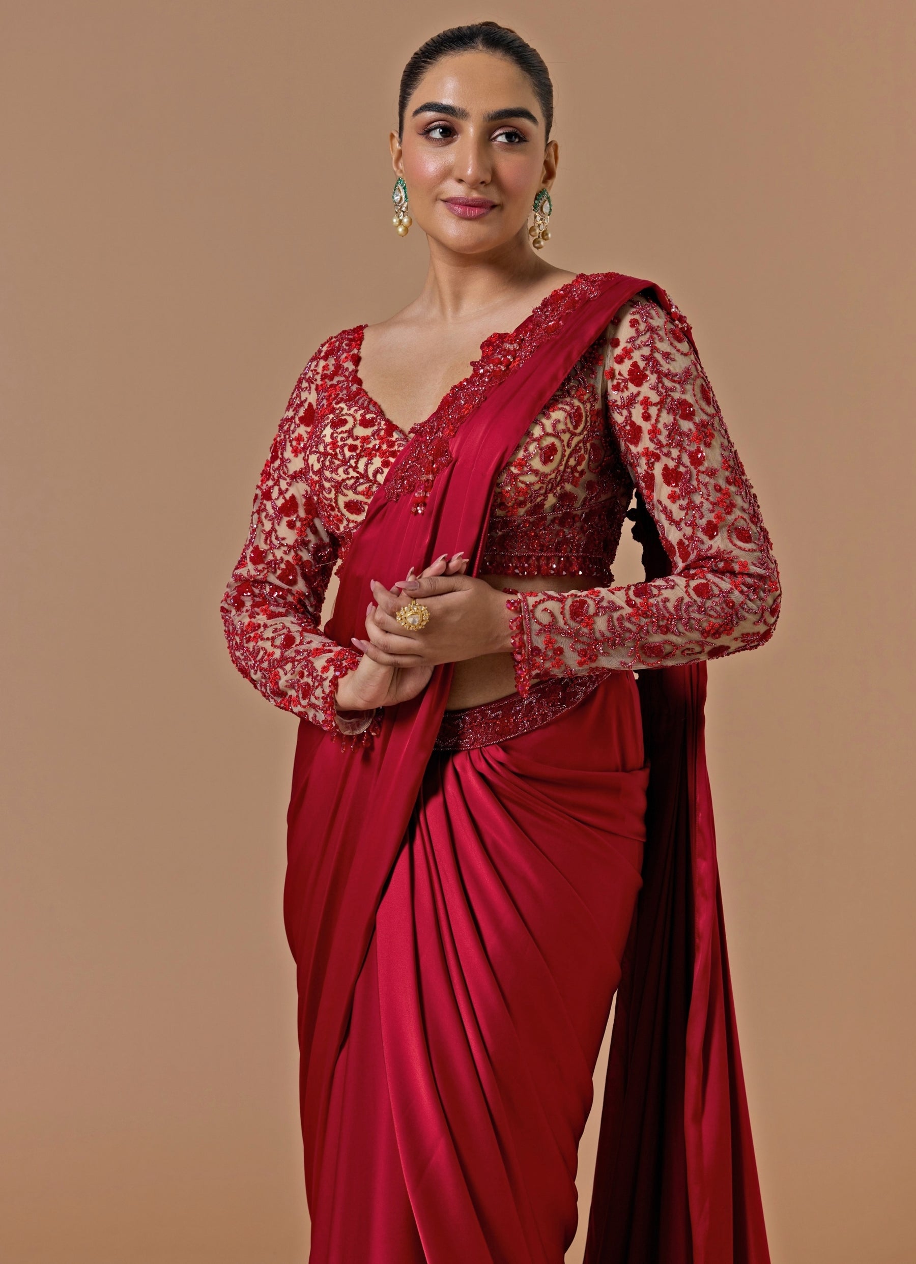 Elegant modern mother of the bride outfit featuring a refined saree silhouette