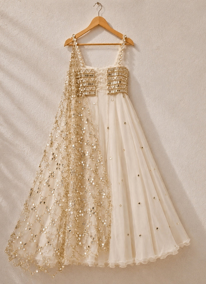 Ivory and Muted Gold Organza Lehenga with Corset Blouse