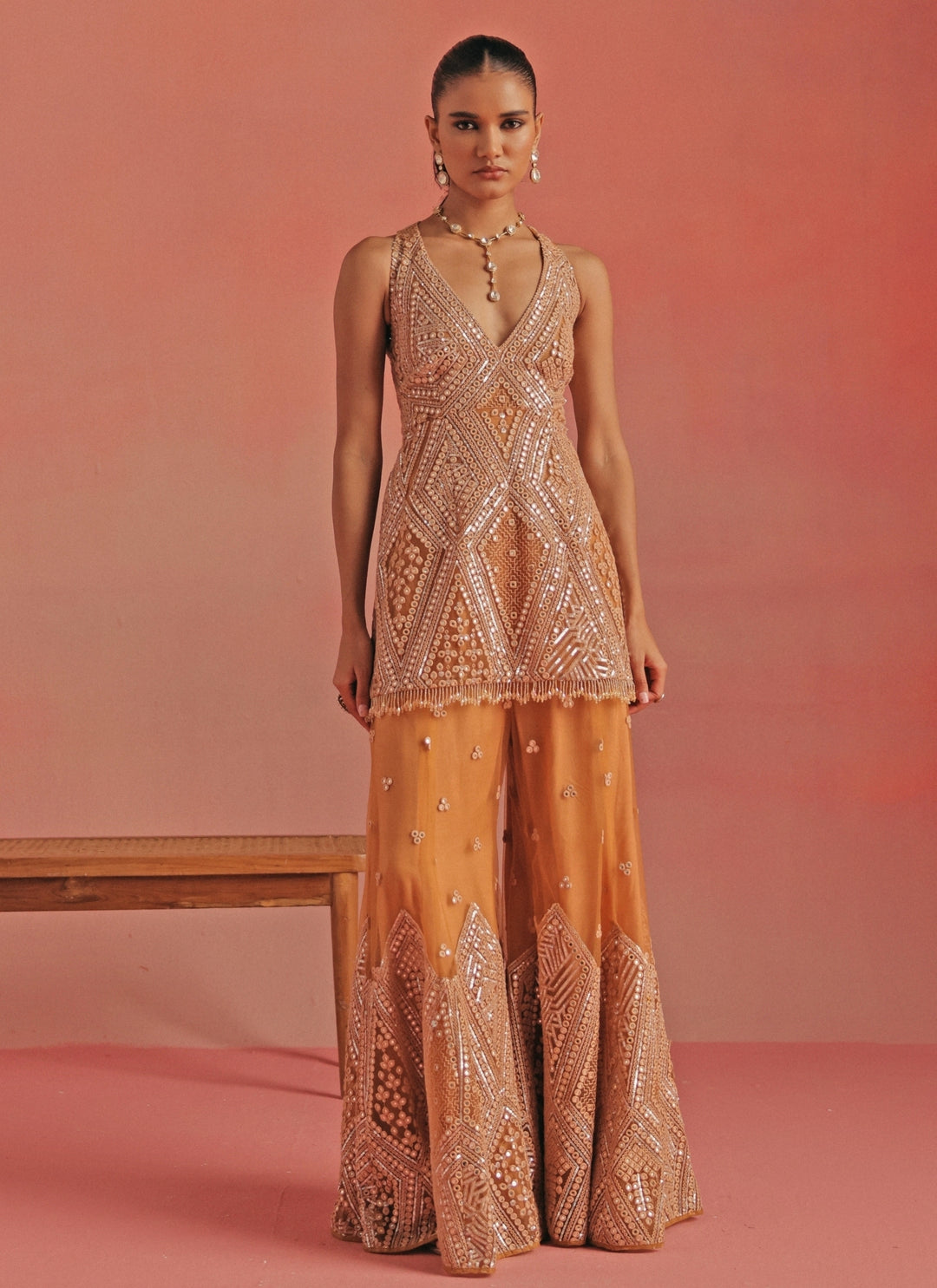 Peach Soft Net Mirrorwork Peplum Kurta Sharara Set