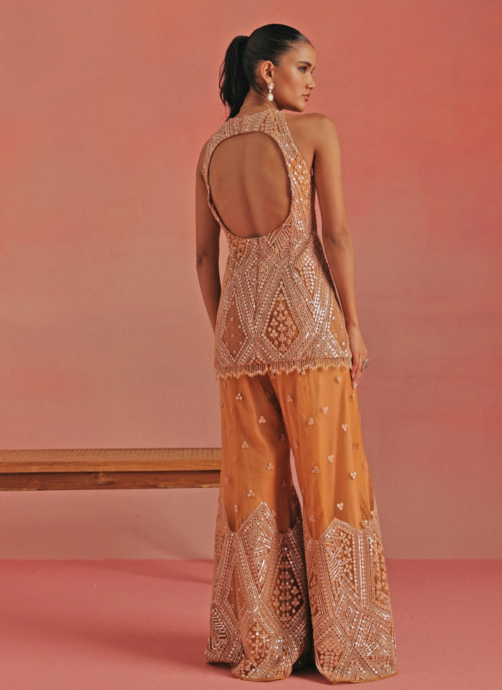 Peach Soft Net Mirrorwork Peplum Kurta Sharara Set