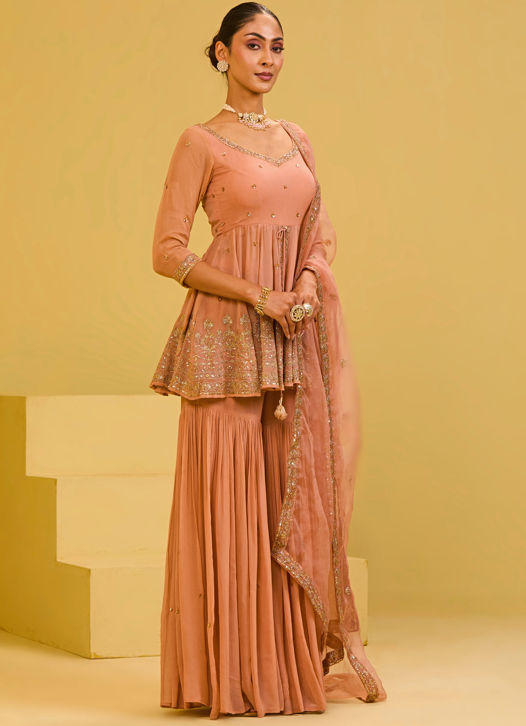 Muted Peach Georgette Peplum Kurta Sharara Set