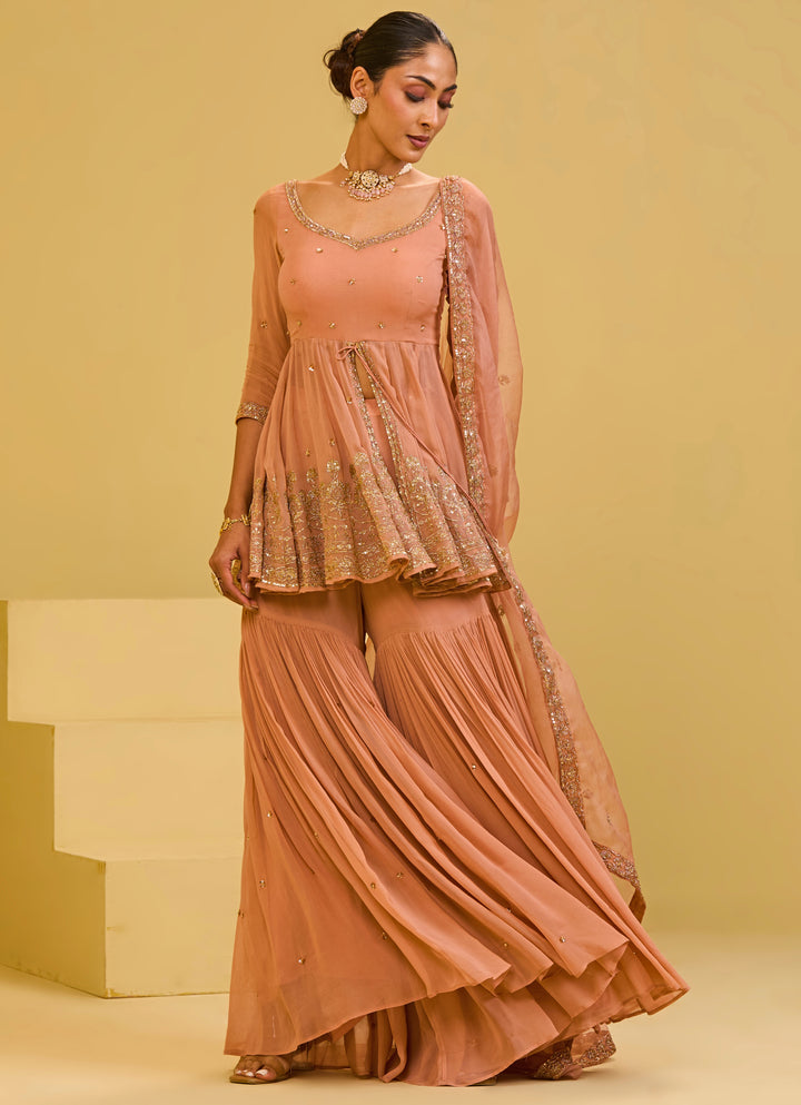Muted Peach Georgette Peplum Kurta Sharara Set