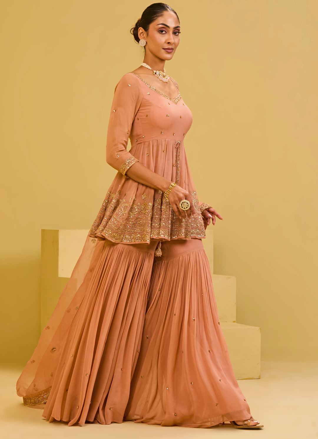 Muted Peach Georgette Peplum Kurta Sharara Set
