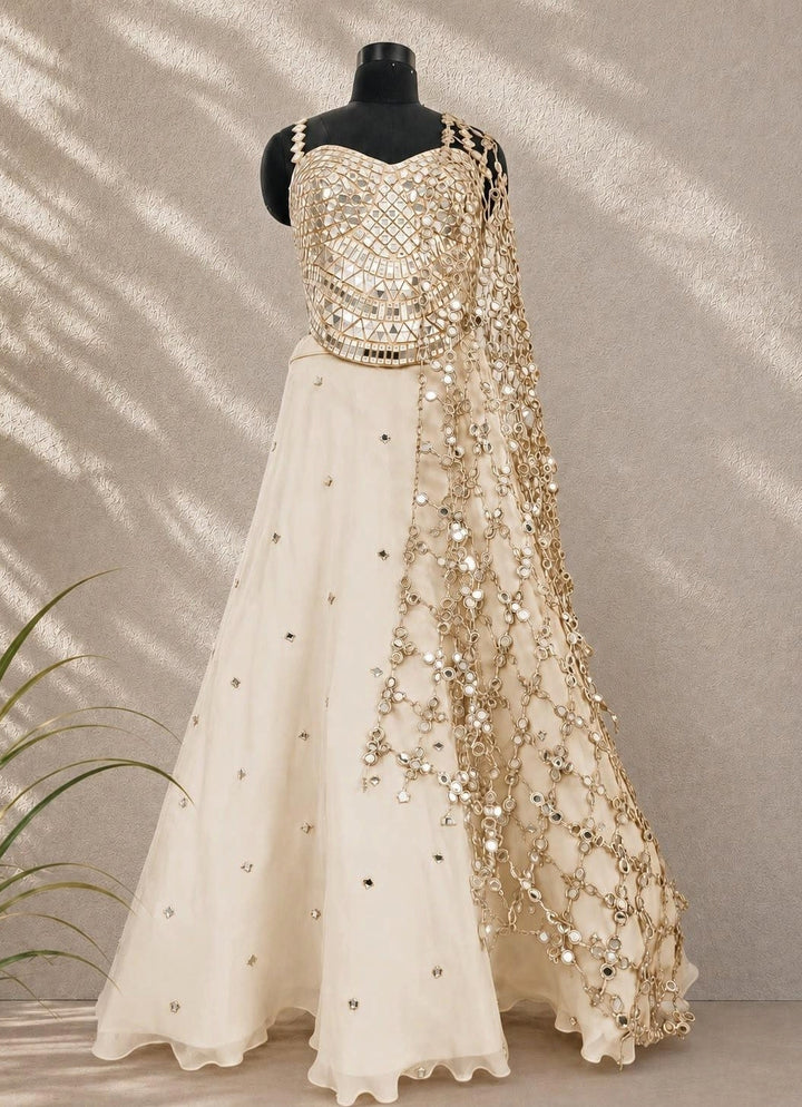 Ivory and Muted Gold Organza Lehenga with Corset Blouse