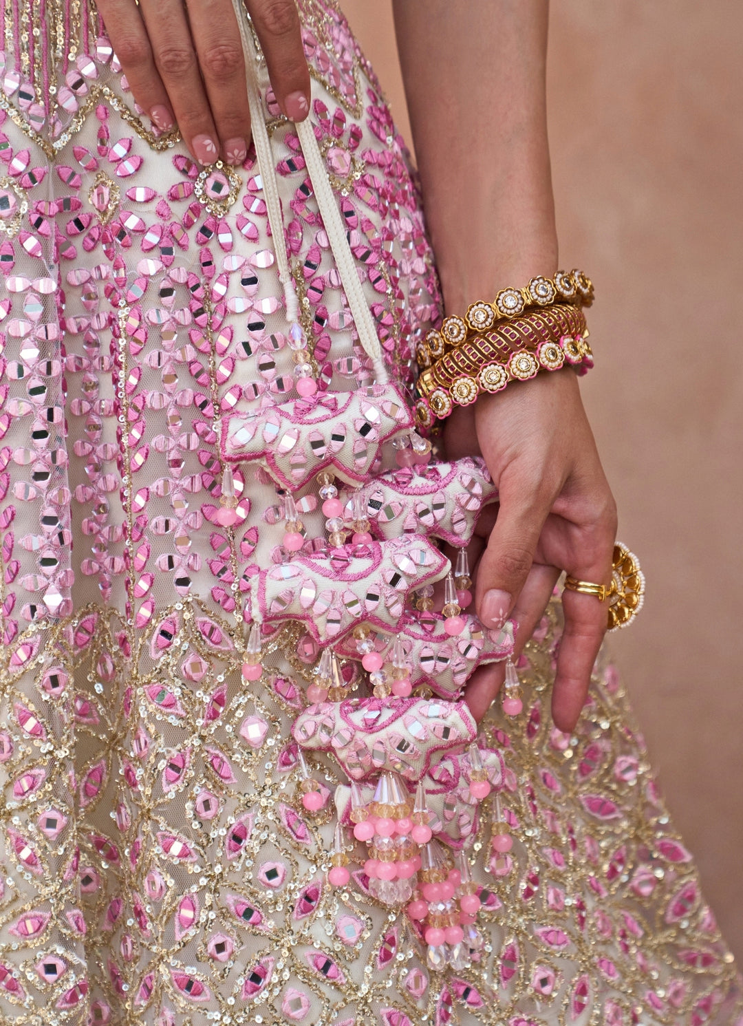 Ivory And Pink Soft Net Lehenga Set