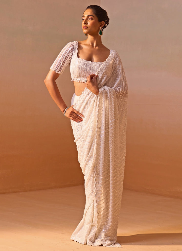 Ivory Georgette Saree With Sequins Blouse