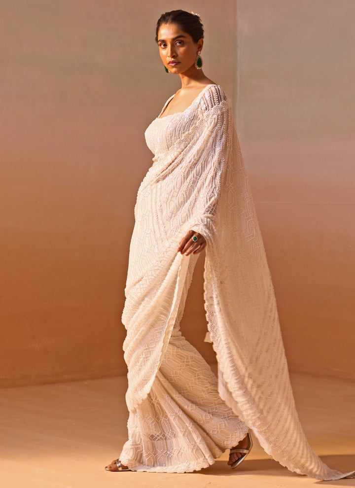 Ivory Georgette Saree With Sequins Blouse