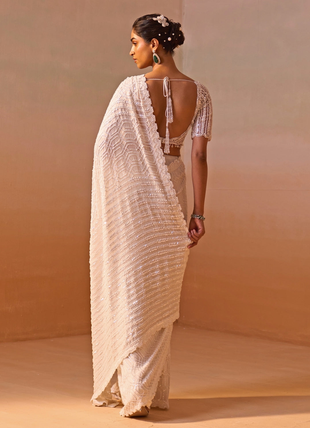 Ivory Georgette Saree With Sequins Blouse