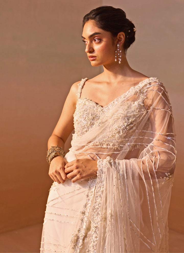 Ivory Embroidered Soft Net Saree