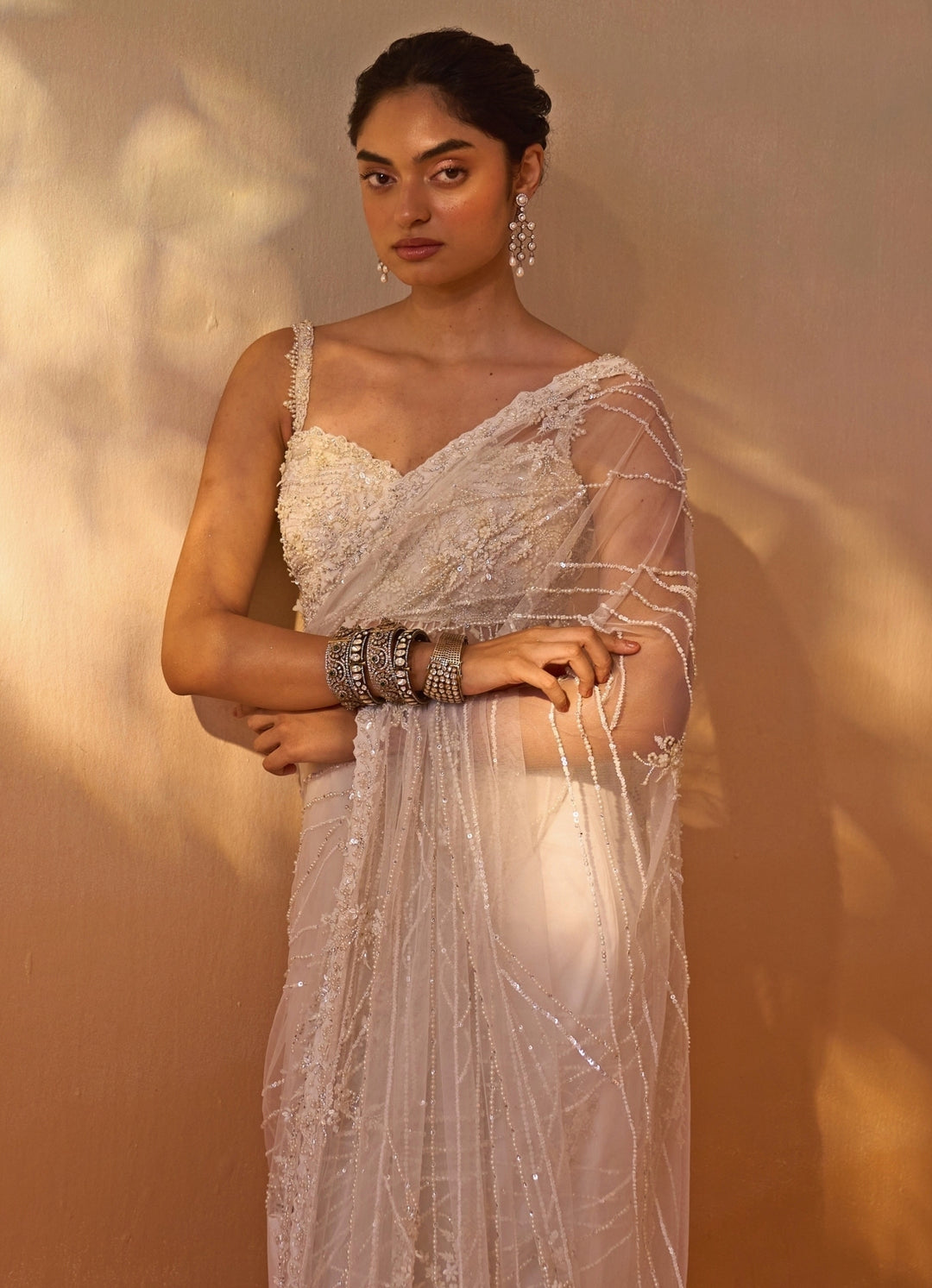 Ivory Embroidered Soft Net Saree