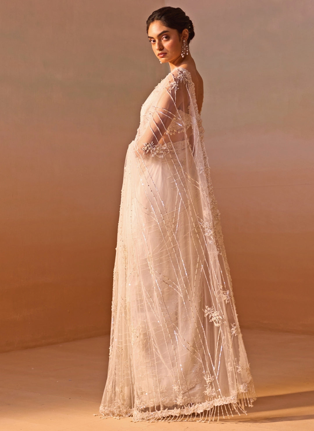 Ivory Embroidered Soft Net Saree