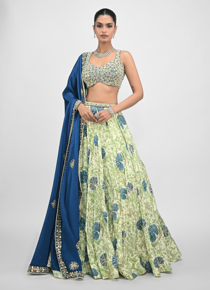 Green Printed Silk Lehenga Set With Contrasting Embroidered Blue Dupatta