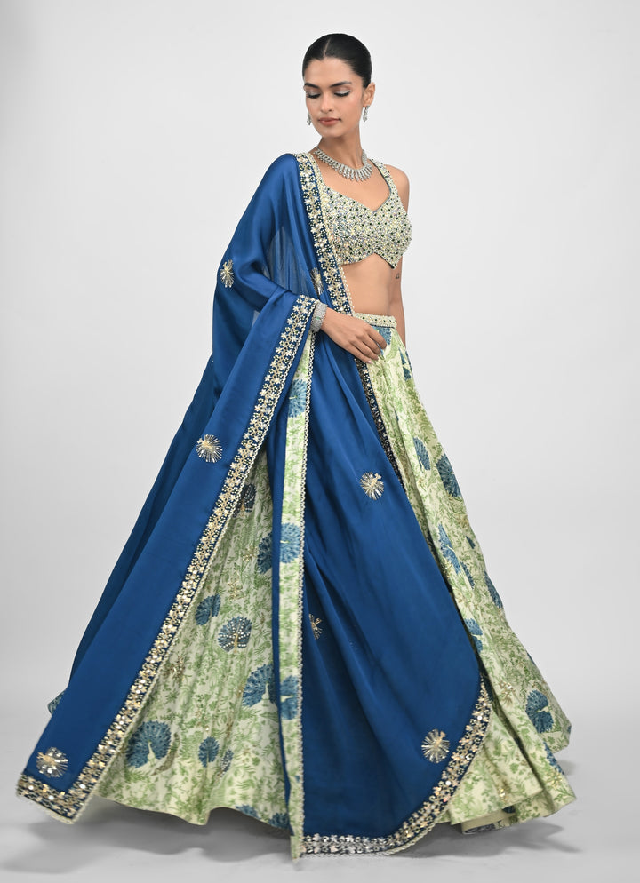 Green Printed Silk Lehenga Set With Contrasting Embroidered Blue Dupatta