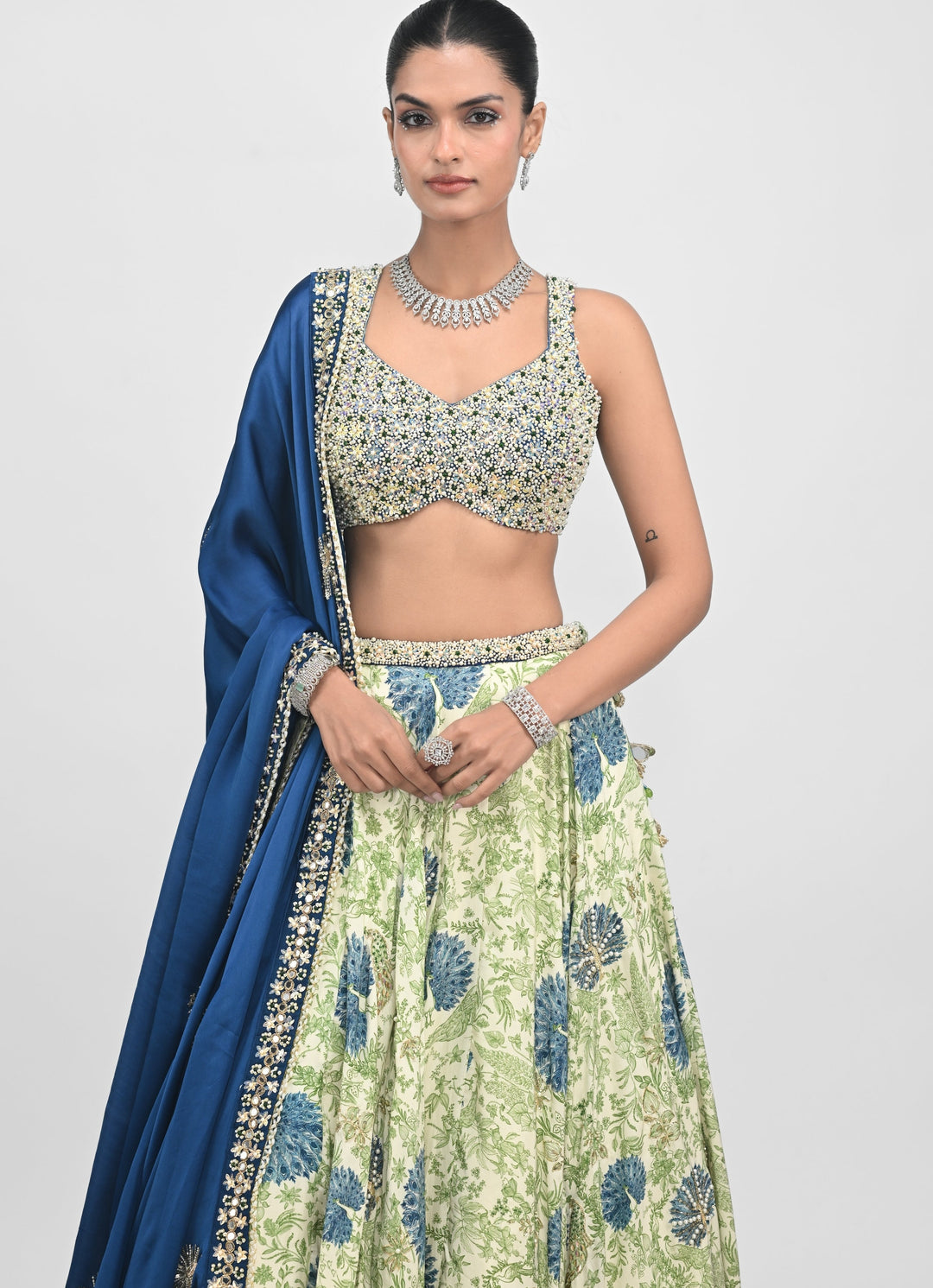 Green Printed Silk Lehenga Set With Contrasting Embroidered Blue Dupatta