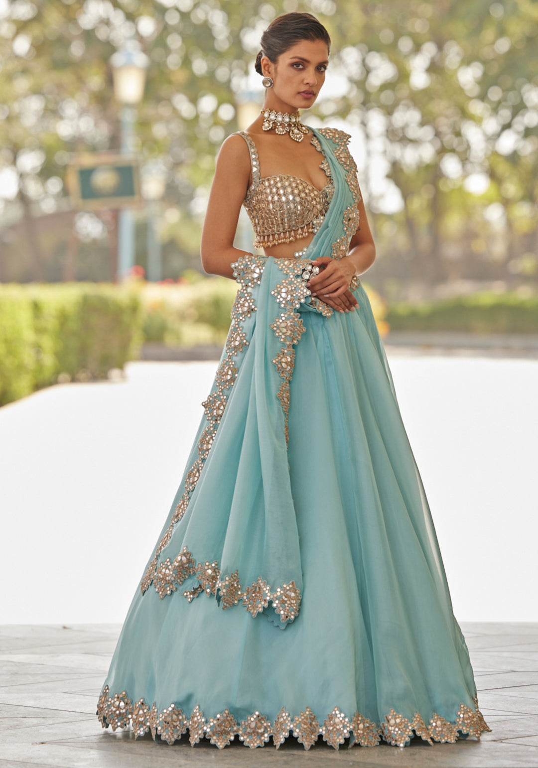 Powder Blue Organza Lehenga With Sleeveless Embroidered Blouse