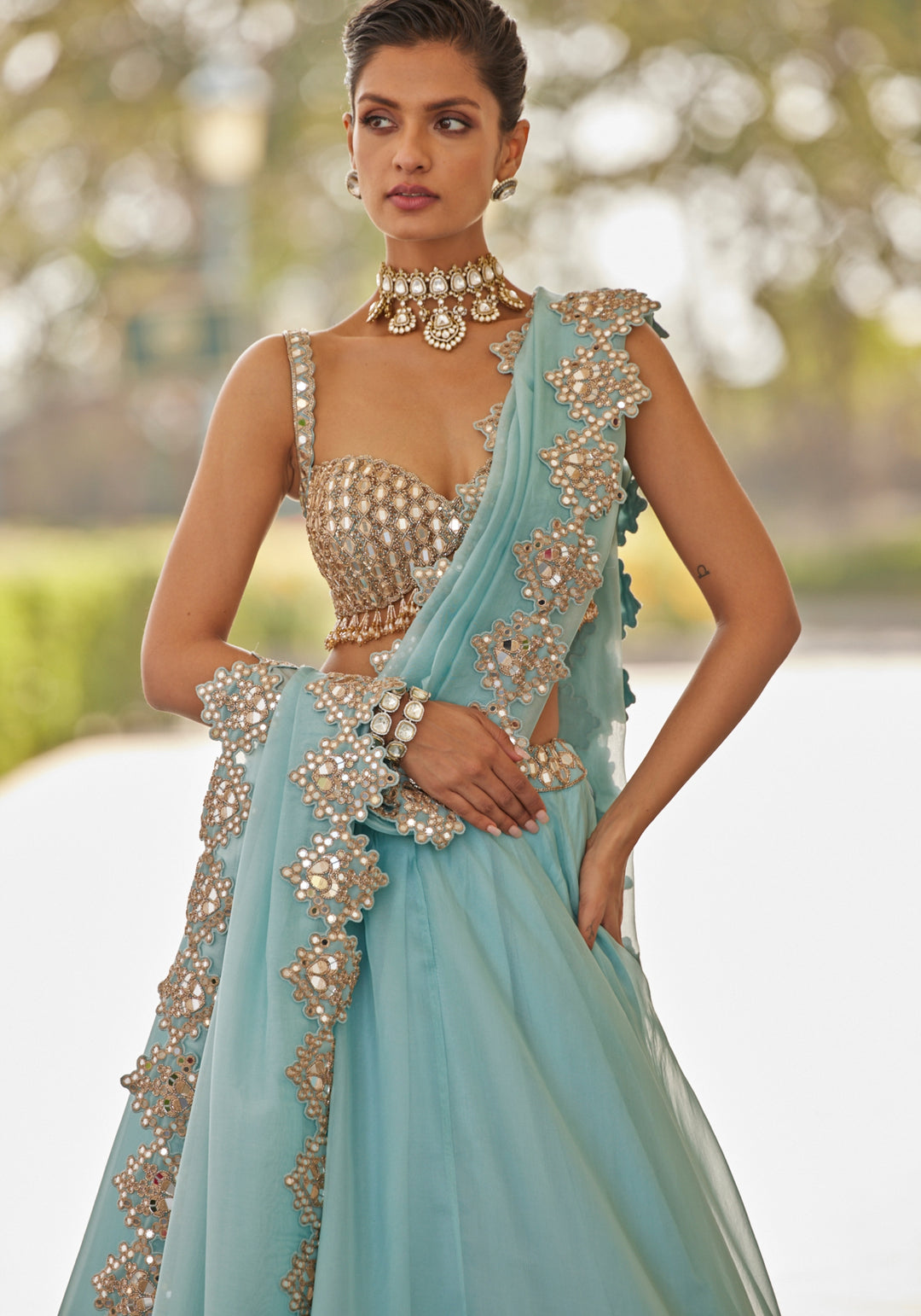 Powder Blue Organza Lehenga With Sleeveless Embroidered Blouse