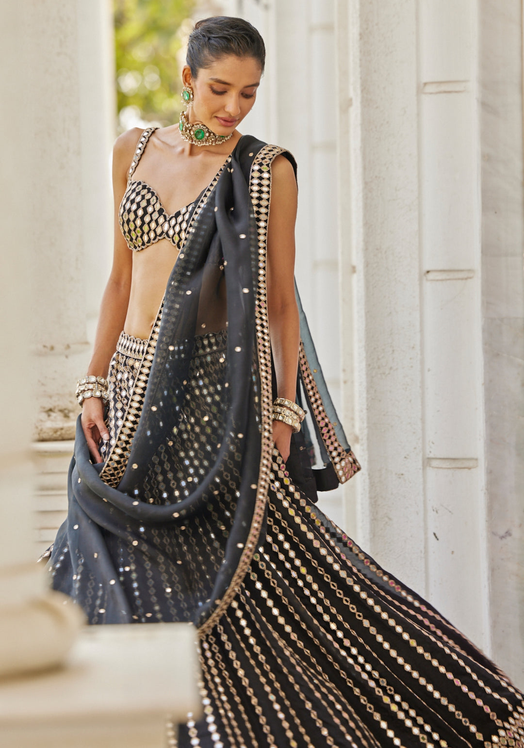 Black Linear Lehenga With Embroidered Sleeveless Blouse