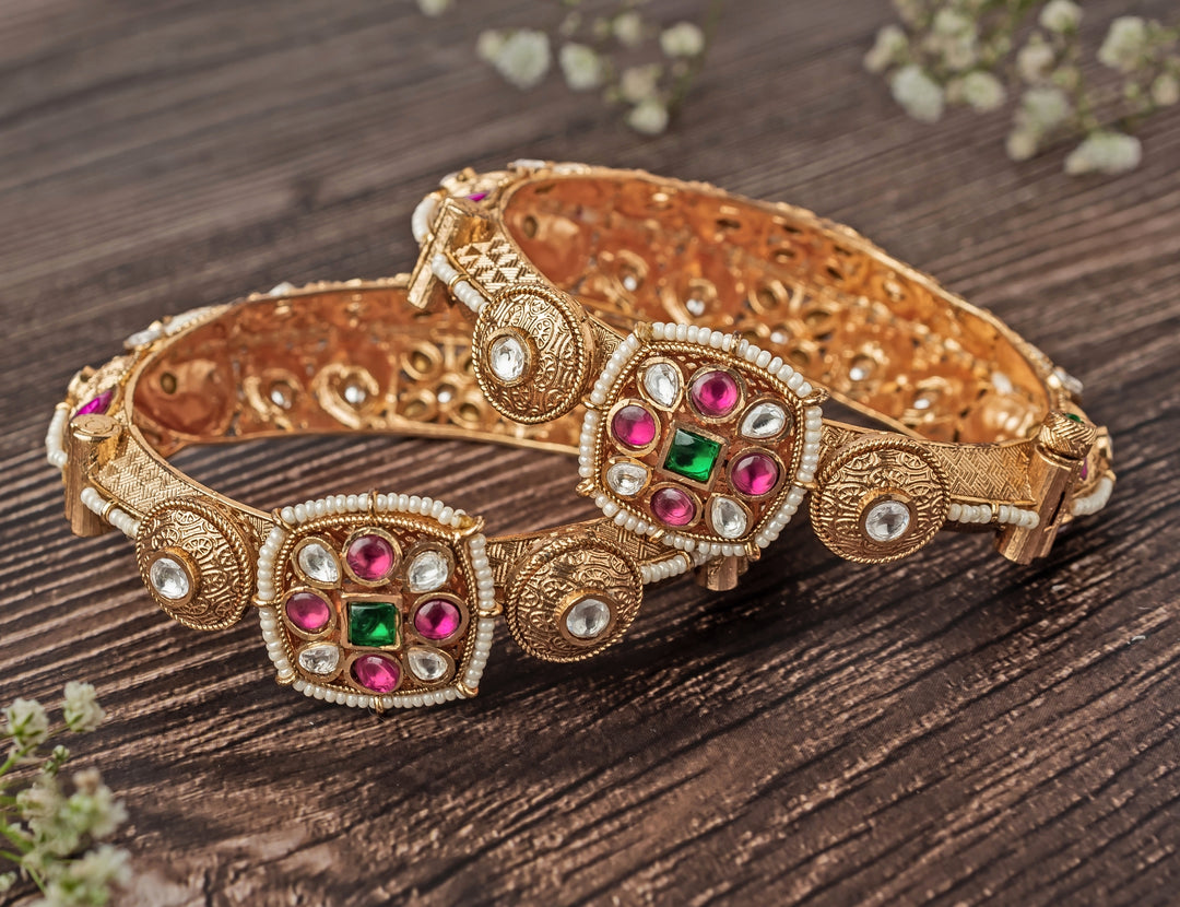 Floral Ruby And Emerald Synthetic Stone Gold Plated Bangles
