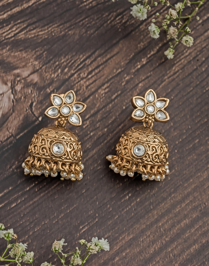 Gold Plated Floral White Stone Jhumka Earrings