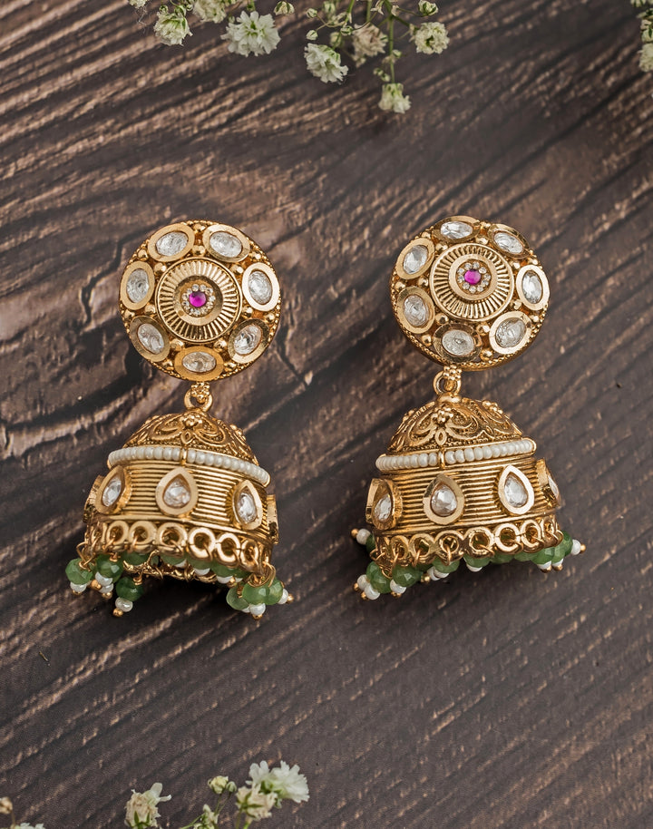 Gold Plated White And Green Stone Jhumka Earrings