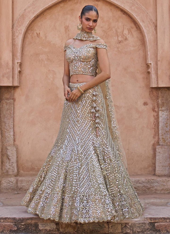 Angad Singh Antique Gold Soft Net Corset Lehenga SetFabilicious Fashion