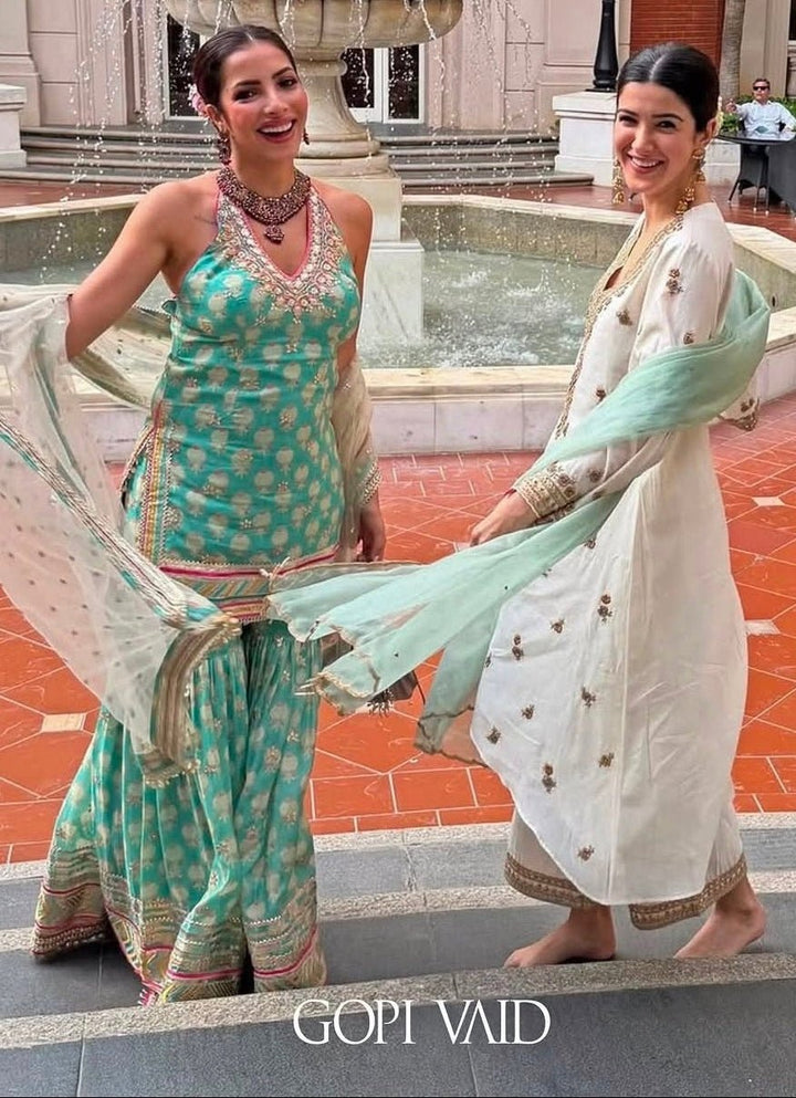 Gopi Vaid Aqua Blue Printed Cotton Silk Halter Kurta Sharara Set With Ivory DupattaFabilicious Fashion
