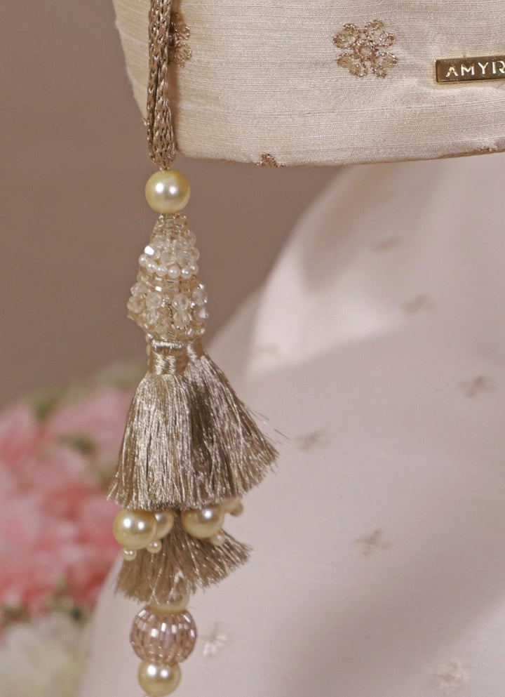 Amyra Beige Embroidered Silk PotliFabilicious Fashion