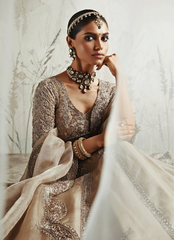 Prisho Beige Embroidered Tissue Lehenga SetFabilicious Fashion