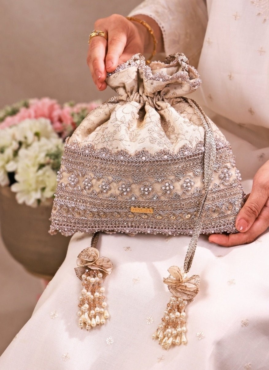 Amyra Beige Embroidered Tissue PotliFabilicious Fashion