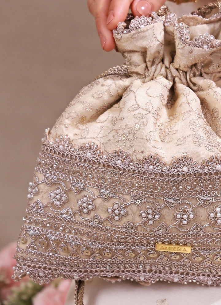 Amyra Beige Embroidered Tissue PotliFabilicious Fashion