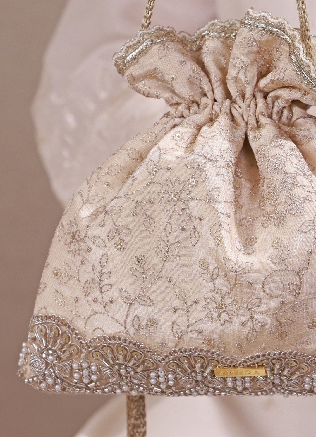 Amyra Beige Embroidered Tissue Silk PotliFabilicious Fashion