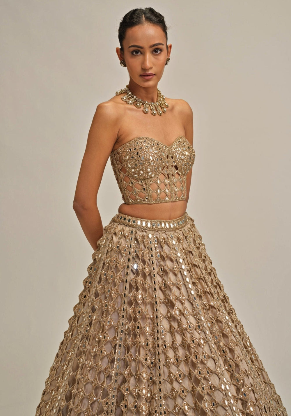 Vvani by Vani Vats Beige Gold Embroidered Georgette Corset LehengaFabilicious Fashion